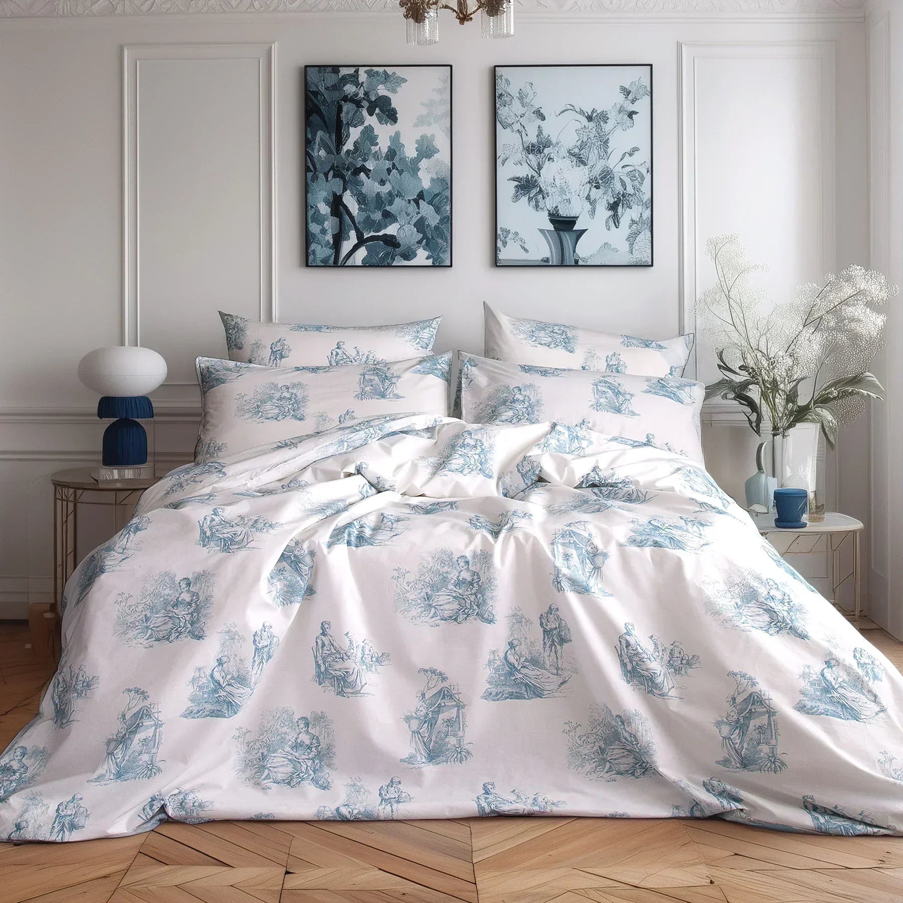 Blue and white toile de Jouy duvet cover set on bed in elegant bedroom